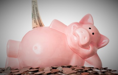 Picture of a pink piggy bank with savings from discounts in Frisco Texas